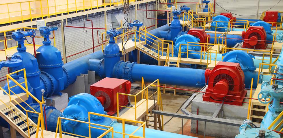 A large blue pipe system with red and yellow pipes.